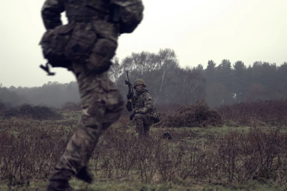 Soldier running past during an exercise