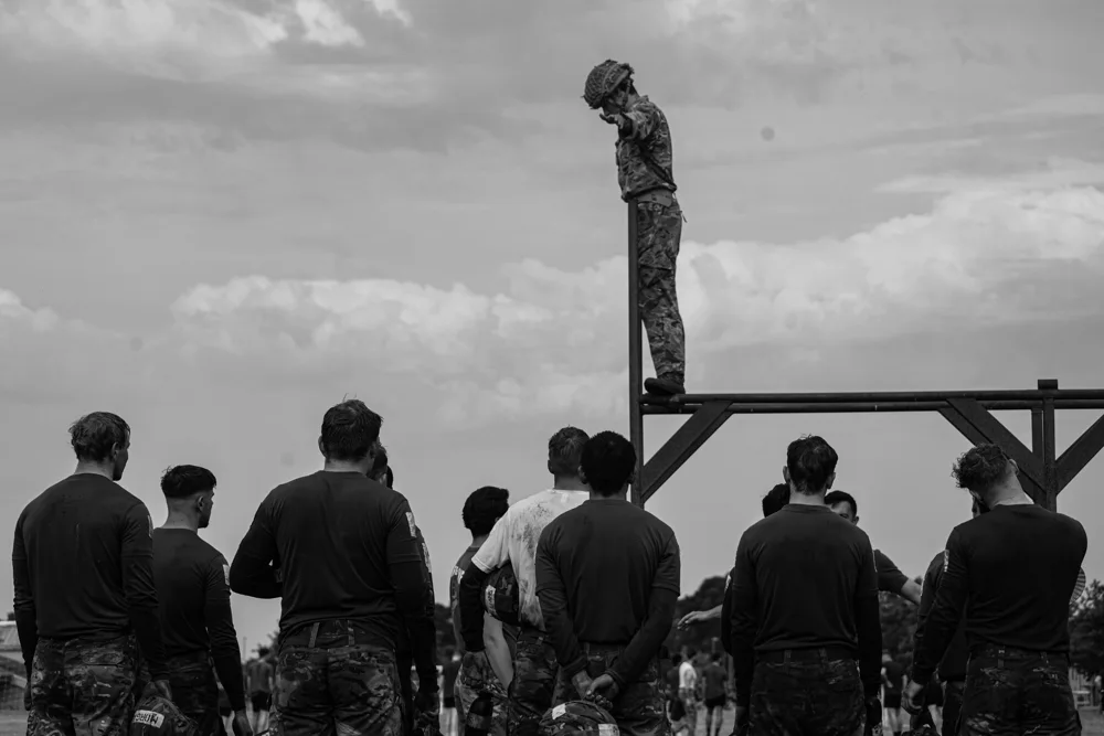 Soldier preparing to cross an elevated obstacle