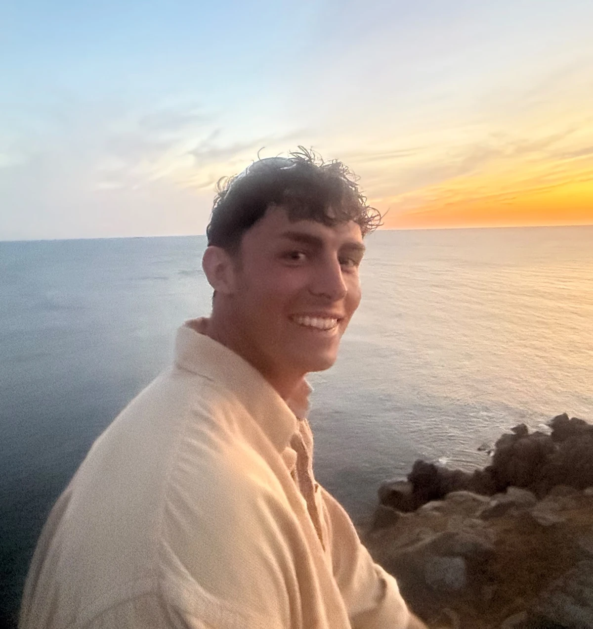 Ollie by the sea at sunset